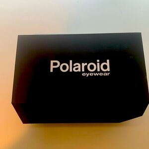 Brand new still in original  package 2 Polaroid sunglasses